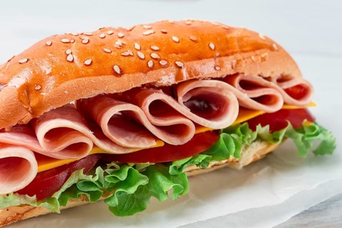 Sandwich submarine, on a white table, close-up, no people, horizontal, homemade