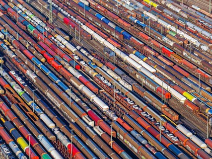 Deutsche Bahn AG marshalling yard. Many goods trains are parked on the tracks with tank wagons, car
