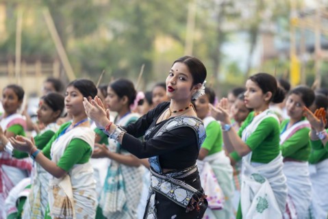 An instructor dance Bihu as she teach bihu dance at a workshop, ahead of Rongali Bihu festival, in