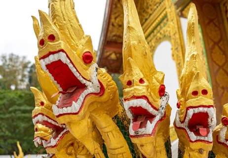 Naga at the steps of Wat Ho Pha Bang temple, Royal Palace, Luang Prabang, Laos, Asia