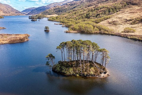 Aerial view of lake Loch Eilt with island Dumbledore's Grave, Harry Potter film location, scottisch