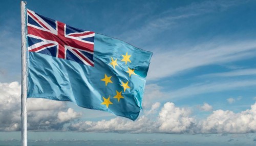 Flags, the national flag of Tuvalu flutters in the wind