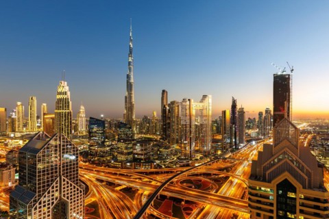 Burj Khalifa skyline tallest building in the world from above in Downtown at night in Dubai, United