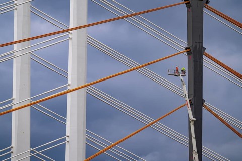 The new Rhine bridge Neuenkamp, the A40, white pillar ropes, and the old motorway bridge, which is