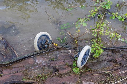 Symbolic image, environmental pollution, wheels with axle of pram, BASF, Lugwigshafen am Rhein,