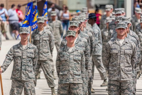 Flights of airmen at parade rest during United States Air Force basic training graduation