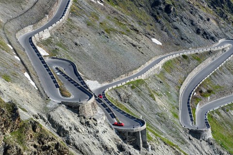 View from an elevated position from a bird's eye view like an aerial view of three hairpin bends in
