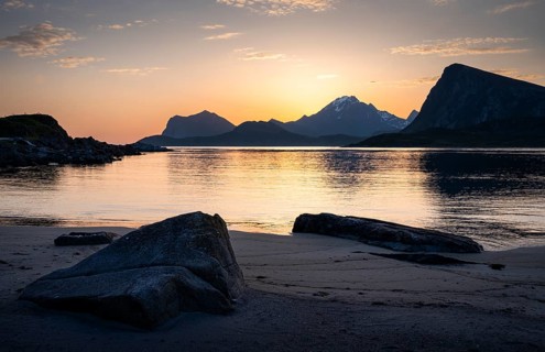 Landscape on the Lofoten Islands. View from Flakstadoya to Vestvagoya, with the snow-covered