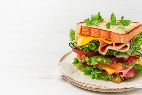 Club sandwich, on a white table, close-up, no people, horizontal, homemade