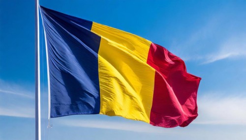 Flags, the national flag of Chad flutters in the wind