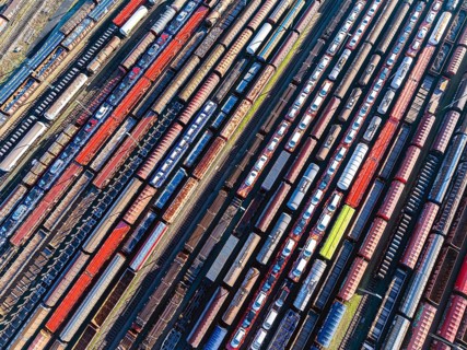 Deutsche Bahn AG marshalling yard. Many goods trains are parked on the tracks with tank wagons, car