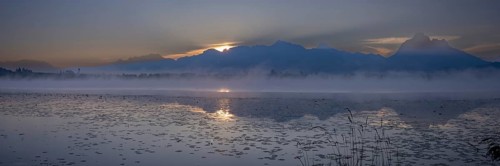 Sunrise at Lake Hopfensee near Füssen, behind Hopfen am See, the Tegelberg massif and the SÃ¤uling,