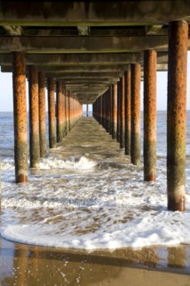 Rusty steel support pillars, Southwold pier, Southwold, Suffolk, England, United Kingdom, Europe