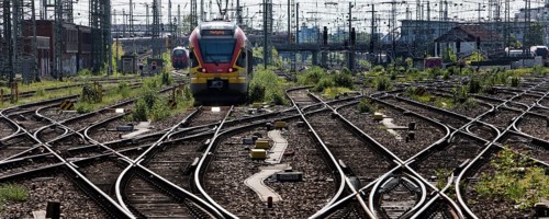 Track apron with rails, infrastructure and a local train at the main railway station, Frankfurt am