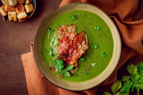 Green mashed soup, with bacon and croutons, homemade, no people