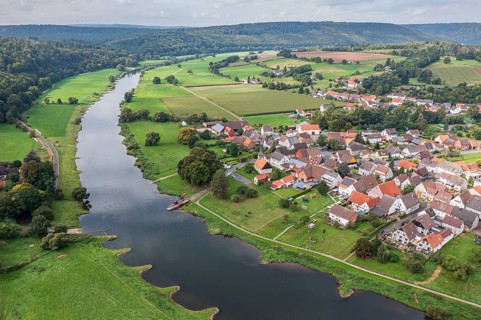 Aerial view of village Wahmbeck and the Weser river, traditional ferry, Weserbergland, Germany,