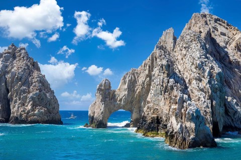Mexico, Los Cabos, boat tours to tourist destination Arch of Cabo San Lucas, El Arco and beaches,