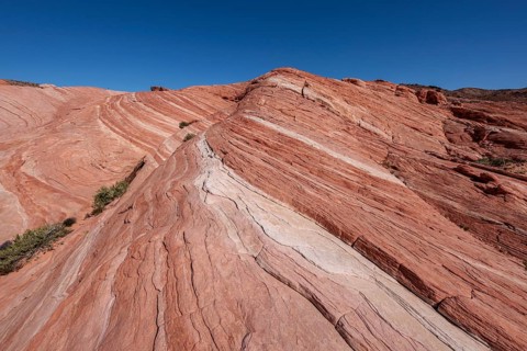 Layered rock formations along the Fire Wave Trail at Valley of Fire State Park near Overton, Nevada