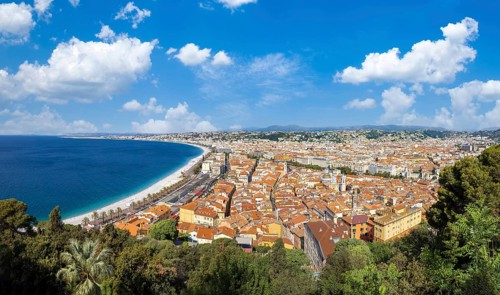 France, panoramic skyline of old historic Nice center and azure beaches along Promenade des