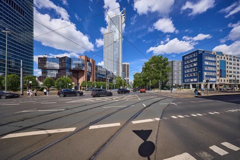Kronenhochhaus or Westend 1, headquarters of DZ Bank on Mainzer LandstraÃŸe under a blue sky with