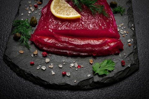 Salmon gravlax with beetroot, Scandinavian snack, beet gravlax, lightly salted fish, homemade, no