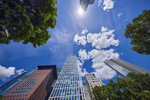 Skyscraper Japan Centre, Taunus Tower and SKYPER skyscraper in blue sky with small cumulus clouds