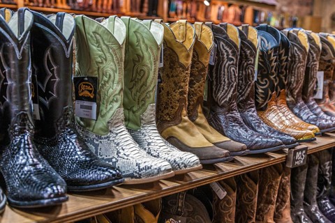 Large variety of cowboy boots for sale at boot store in downtown Nashville, Tennessee
