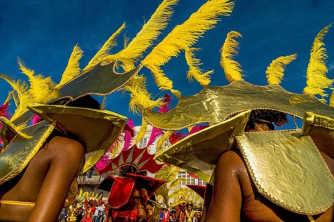 Colourful costumed, pretty women are dancing. Carnival. Mindelo. Cabo Verde. Africa