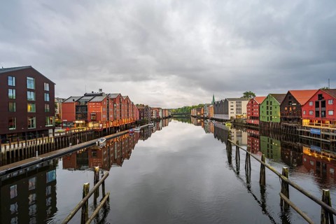 Old warehouses by the river Nidelva, Trondheim, Norway, Europe