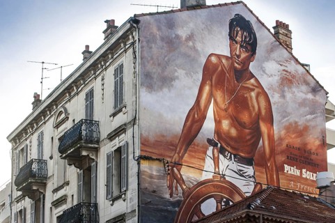 Wall painting of the French movie star Alain Delon in the film Plein Soleil by René Clément in the