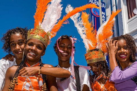 Costumed people celebrating Carnival. Mindelo. Cabo Verde. Africa