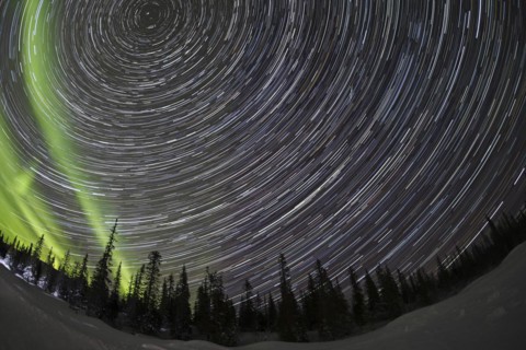 Star trails with Northern Lights over Pallas YllÃ¤stunturi National Park, Lapland, Finland, Europe