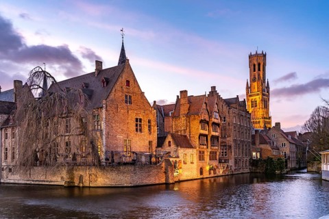Rozenhoedkaai canal with belfry at dusk, Bruges, Belgium, Europe