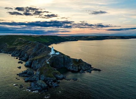 Sunset over Start Point Lighthouse from a drone, Trinity House and South West Coast Path, Devon,