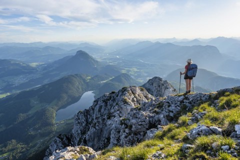 Hintersteiner Lake in the mountains, view from Schaffauer, hiker on a ridge in the mountains,