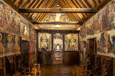 The painted interior of the barn-roofed Church of Archangelos Michail or Church of St. Michael the