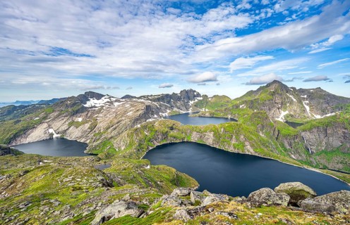 Mountain landscape with steep rocky peaks and lake Tennesvatnet, Krokvatnet and Fjerddalsvatnet, in