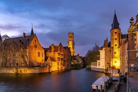 Rozenhoedkaai canal with belfry at dusk, Bruges, Belgium, Europe
