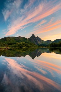 Mountains and clouds reflected in the sea, evening mood, near Sto, Langoya Island, Vesteralen,