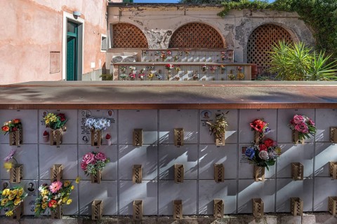 Flower-decorated urn graves in an inner courtyard, Monumental Cemetery, Cimitero monumentale di