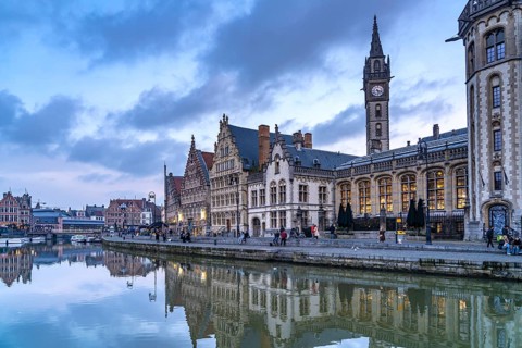 Medieval guild houses of Graslei Kai on the river Leie at dusk, Ghent, Belgium, Europe