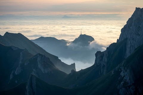 Hoher Kasten and mountains at sunrise, high fog in the valley, view from SÃ¤ntis, Appenzell