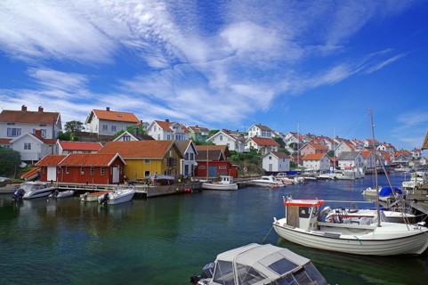 The small harbour of the archipelago island Gullhomen and small fishermen and leisure boats,
