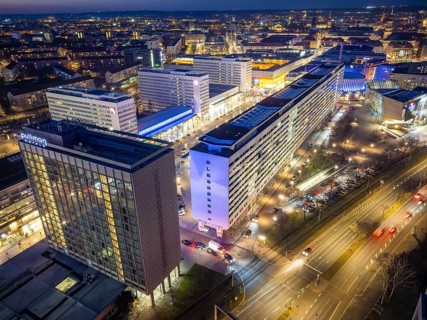 Prager StraÃŸe and St. Petersburger StraÃŸe, with the Prager Spitze, the Pullmann Hotel, the
