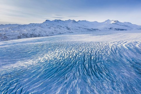 Aerial view over ice tongue Falljökull in winter, one of many outlet glaciers of Vatnajökull, Vatna