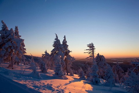 View from the snow-covered Fichtelberg to the Ore Mountains