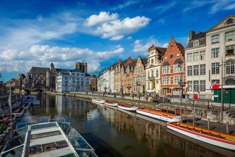 Travel Belgium medieval european city town background with canal. Koperlei street, Ghent, Belgium,