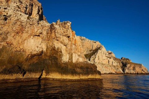 Evening light, Boat tour, View from the sea, Bizarre rock formations, Rugged mountains, Marettimo,