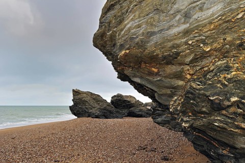 Pebble beach and eroded rocks at Saint-Hilaire-de-Riez, La Vendée, Pays de la Loire, France, Europe