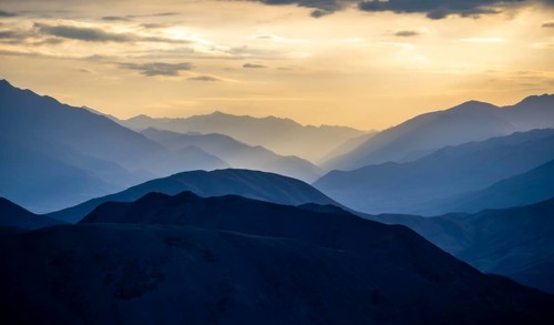 Mountain silhouettes at sunset, Konorchek Canyon, Chuy, Kyrgyzstan, Asia